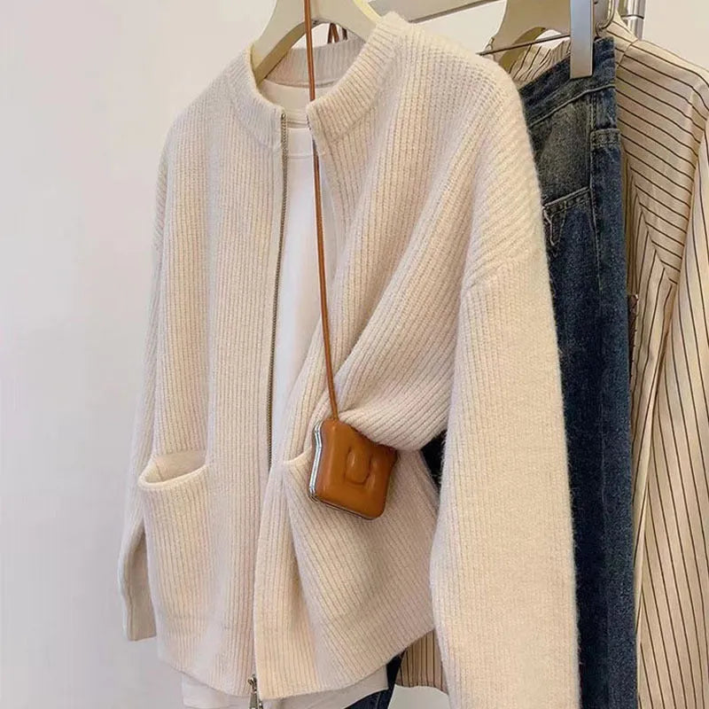 Beige soft glutinous sweater coat cardigan with long sleeves on hanger