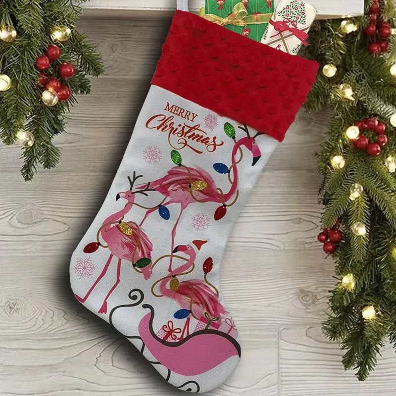 Flamingo Christmas stocking holiday decoration in cloth material measuring 46cm by 28cm