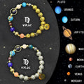 Two natural stone beaded bracelets showing zodiac sign charms on a wooden surface.
