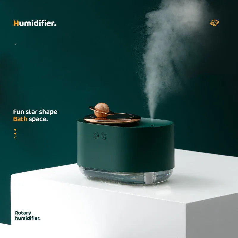 Rotating planet humidifier in colourful ABS plastic with USB charging cable