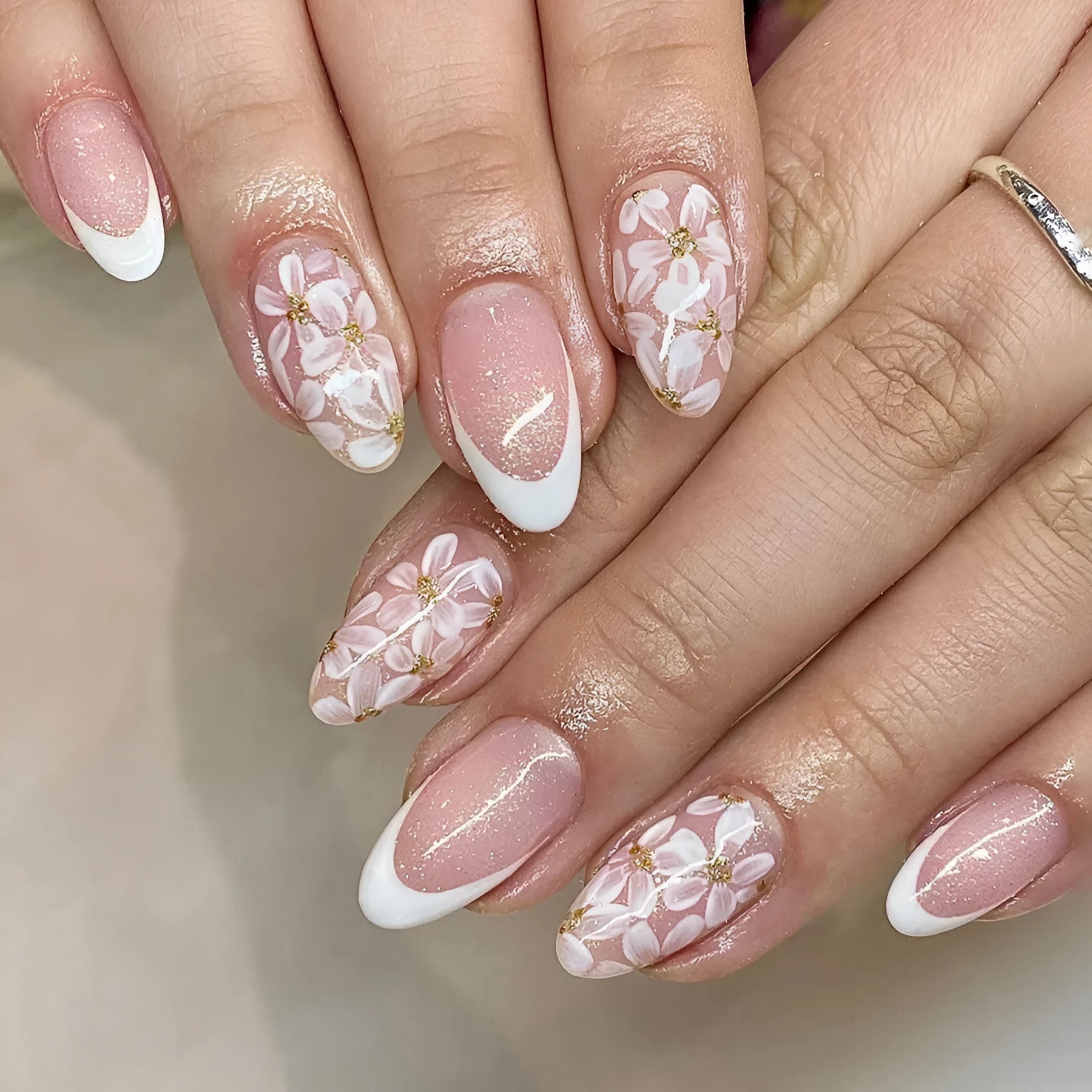 Short almond French style nails with glitter powder flower design in C625 colour