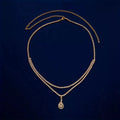 Gold rhinestone waist chain with tassel drop pendant and lobster clasp closure