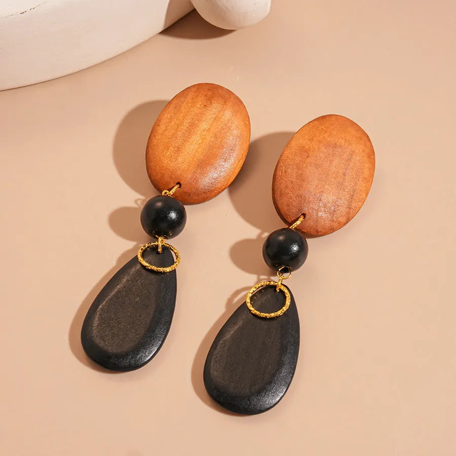 Retro wooden earrings in silver brown black colour with elliptical shape and European style