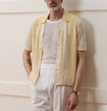 Yellow casual polo shirt with hollow-out design and asymmetric hem, short sleeves, Tencel fabric