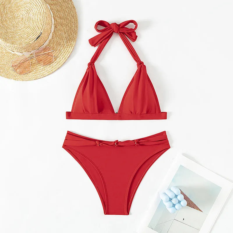 Women's red lace-up halterneck bikini set for swimming and beach activities