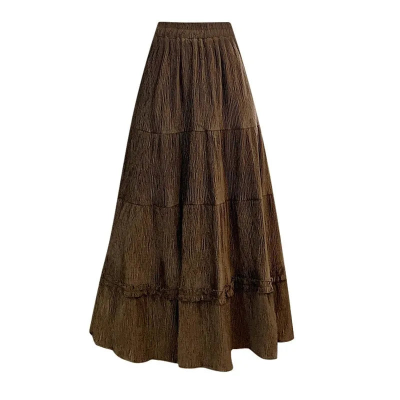 Women's milky white corduroy A-line midi skirt with an elastic waistband on a hanger.