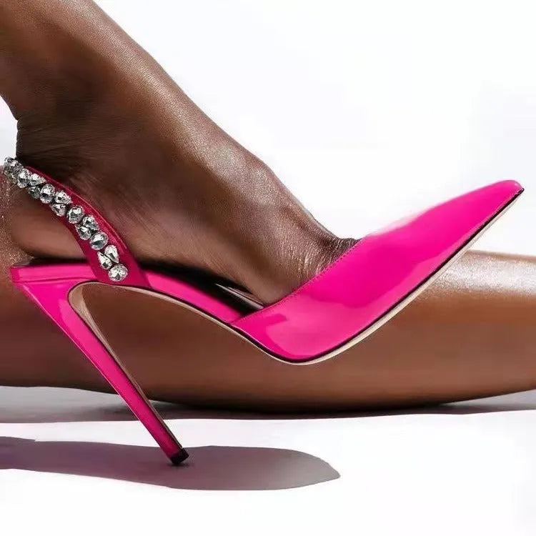 Women's black patent leather pointed toe high heel sandals with rhinestone details on the sides