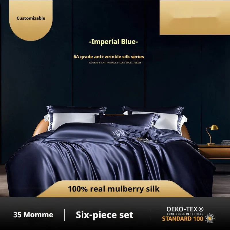 Solid colour silk quilt cover set on a bed in champagne gold, showing flat sheet and pillowcases.