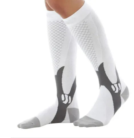 Athletic fit graduated compression socks for men and women in black, shown on a leg.