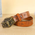 Men's brown belt with detailed cow head alloy buckle and imitation leather strap showing pin buckle closure