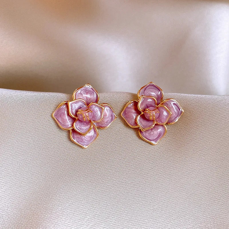 Gold plated copper stud earrings with purple oil-spot glaze flower decorations