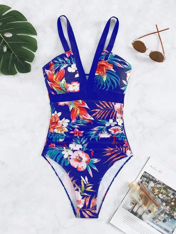 Backless floral one-piece swimsuit for women in a high-stretch polyester-spandex fabric.