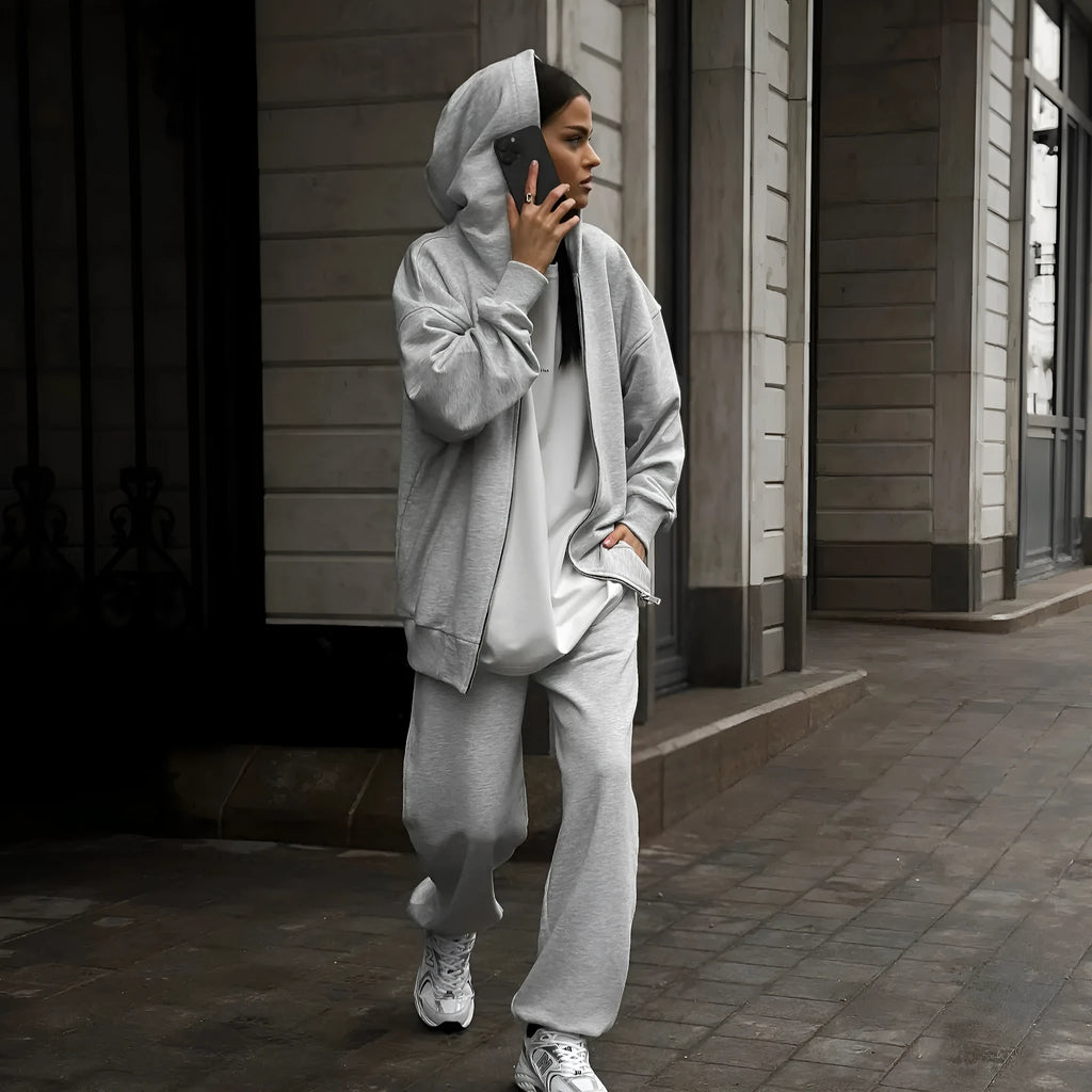 Loose fit red polyester street style coat and trousers two-piece set on a hanger