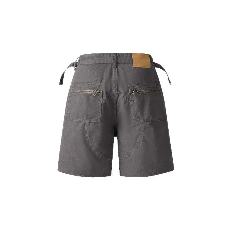 Retro washed cotton workwear shorts with half elastic waistband in loose fit
