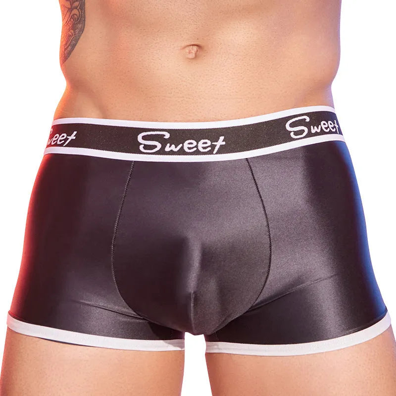 Men's shiny silky nylon boxers in black, white, and sapphire blue colours, free size.