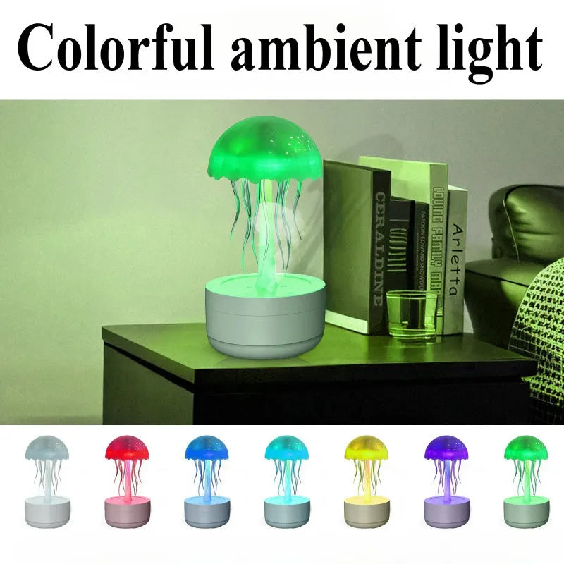 White jellyfish-shaped humidifier and essential oil diffuser with colourful LED night light on a desktop.