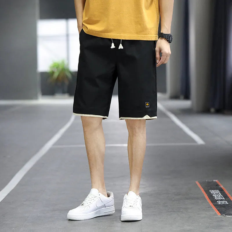 Men's loose-fit Korean-style casual beach shorts in blue, available in sizes up to 8XL.