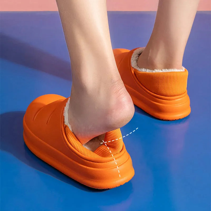 Women's waterproof garden slipper in green with plush lining and a textured non-slip EVA sole.