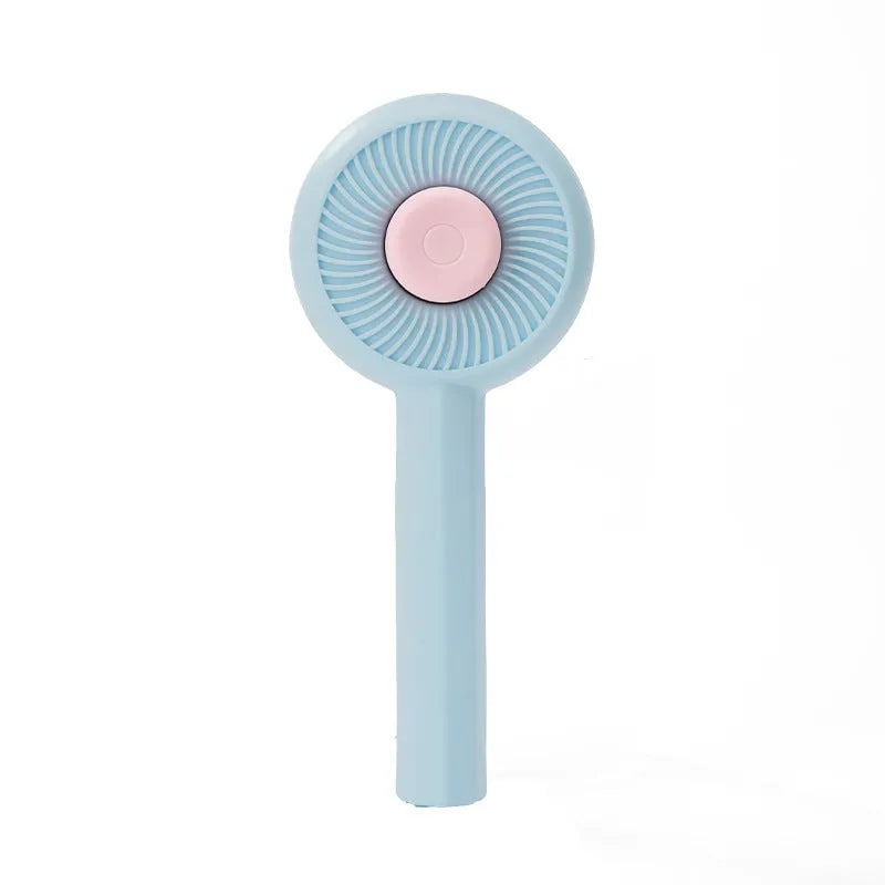 Blue self-cleaning pet grooming brush with angled metal needles and a yellow button.