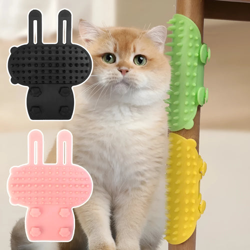 Silicone cat self-grooming brush with comb teeth and adjustable strap for table legs.