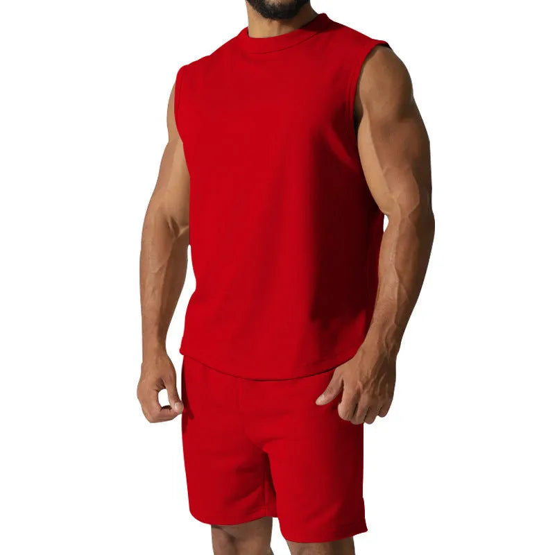 Men's sleeveless cotton blend sports top and shorts set in a solid colour.