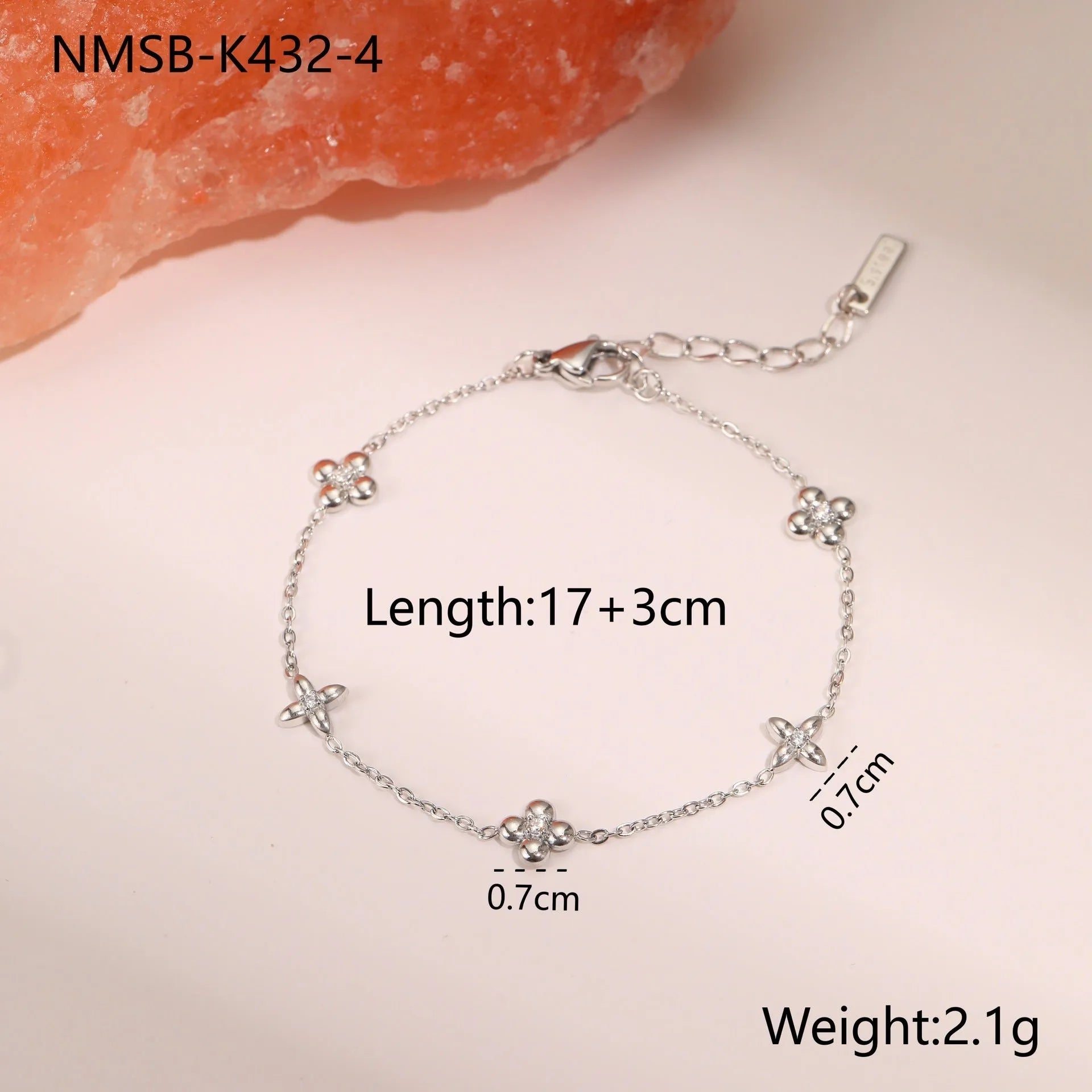 Women's titanium steel bracelet with gold plating and geometric star pendant