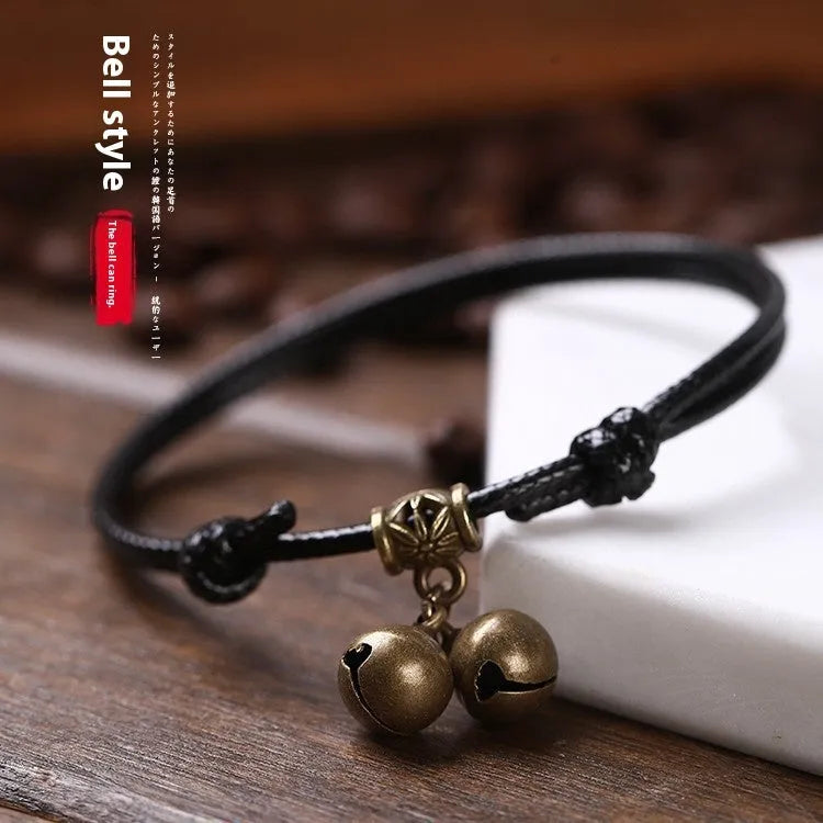 A nylon rope dog collar with brass fittings, shown in black, red, and coffee colours.