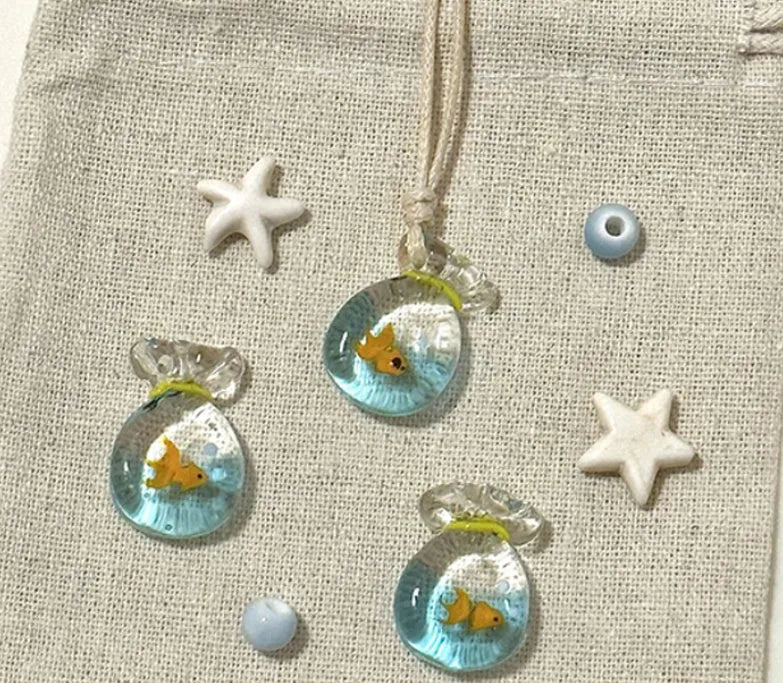 Women's pendant necklace with coloured glaze skirt joker charm on cotton linen clavicle chain