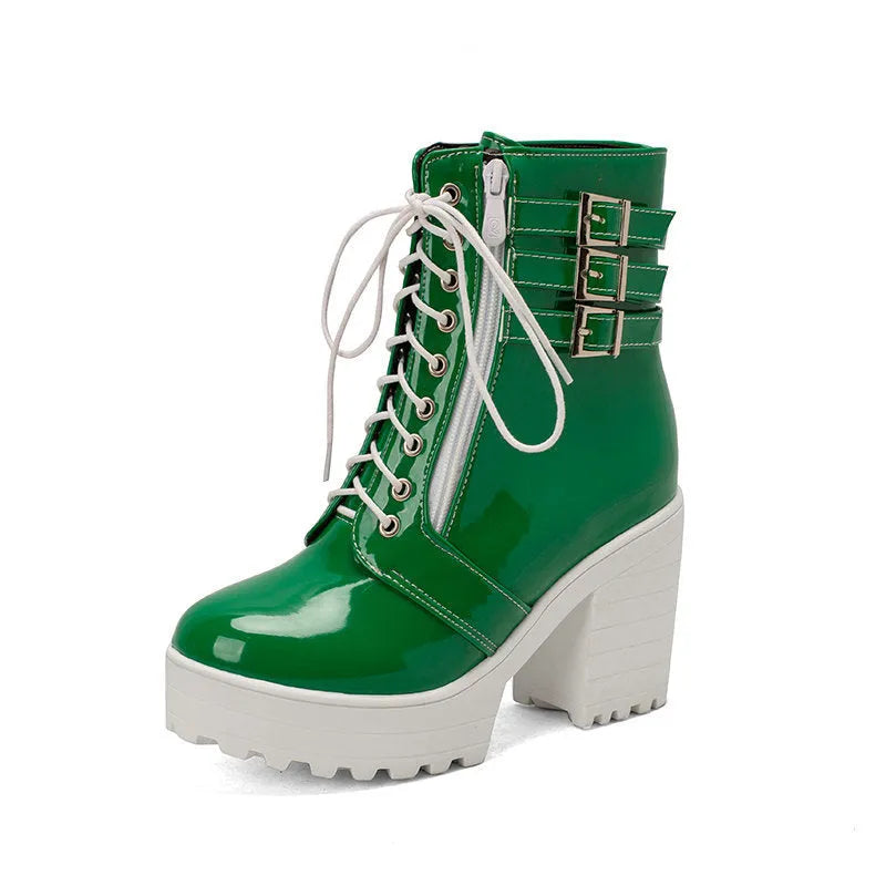 Women's black thick-heeled lace-up ankle boots with a round toe and rubber sole on a waterproof platform.