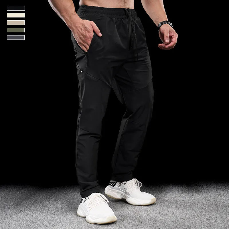 Men's waterproof quick-drying workout trousers in nylon fabric available in multiple colours and sizes