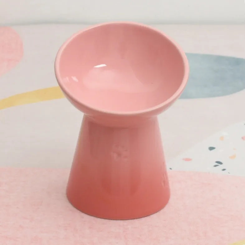 Ceramic pet bowl with anti-tumble design and raised chin support for cats and dogs