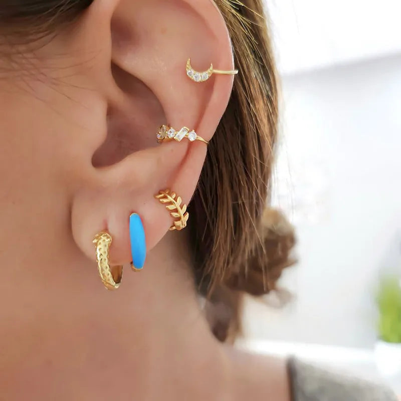 Curved U-shaped oval earrings with a glossy epoxy finish in a choice of seven colours.