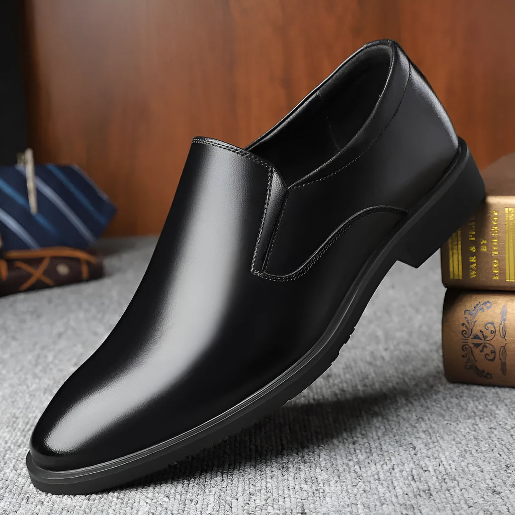 Men's black leather slip-on business casual shoes with rubber sole and low top design