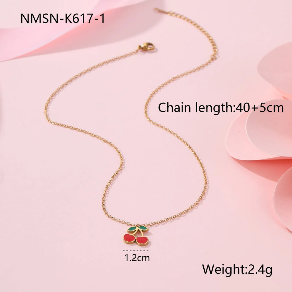 Complete cherry jewellery set showing stainless steel necklace, bracelet, earrings and ring with 18K electroplated finish