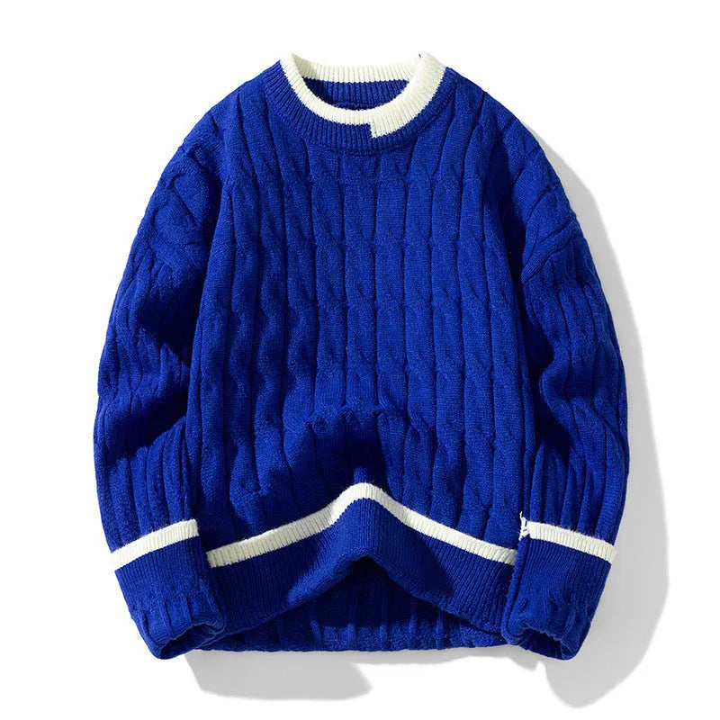 Man wearing a loose-fit long sleeve modal sweater in light blue, part of a two-piece set.