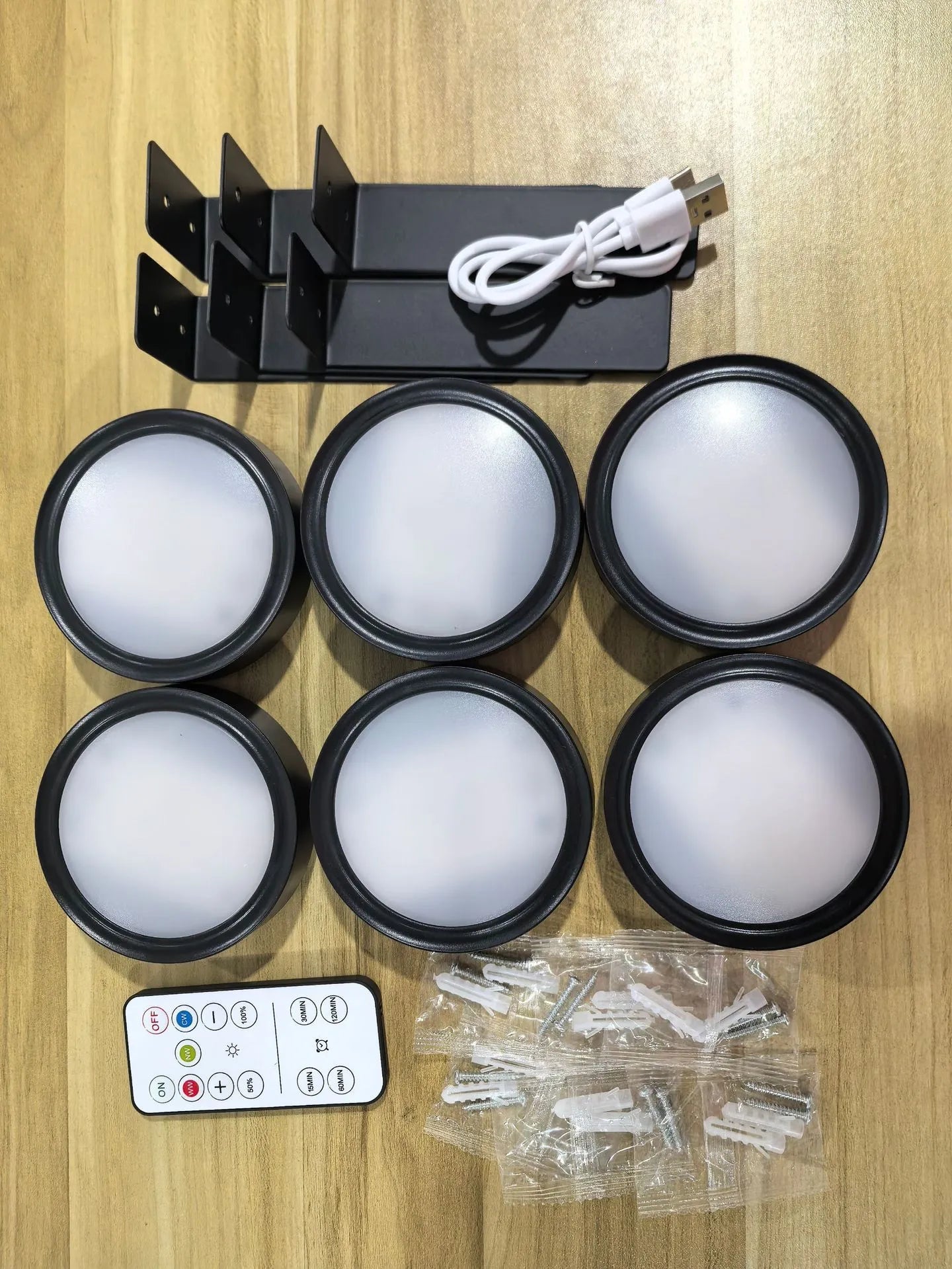 Wireless LED painting lamp with magnetic charging and remote control in black, white or gold finish