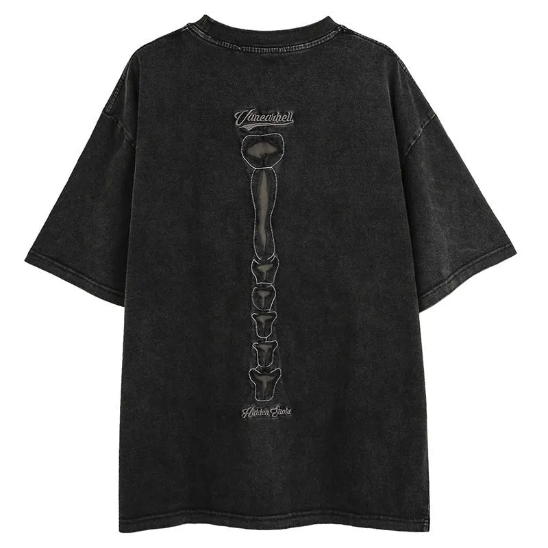 Brown loose fit men's T-shirt with a large printed skull and letter design, featuring drop shoulder sleeves.