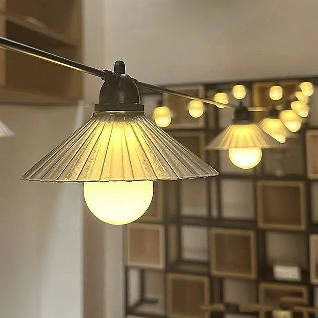 Outdoor LED string lights with flower-shaped bulbs in garden setting showing IP65 waterproof rating