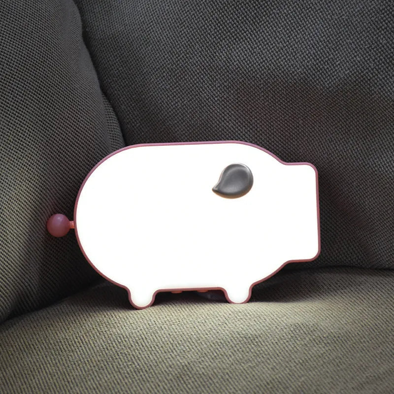 Blue multifunctional LED alarm clock showing time and temperature with USB charging cable