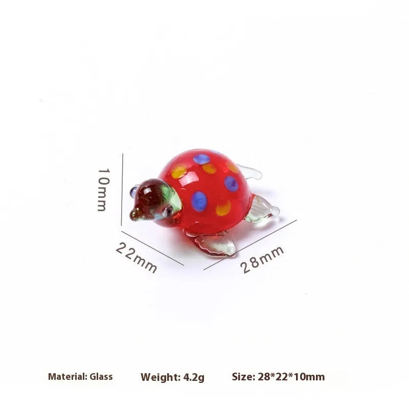Geometric glass turtle desktop ornament in a modern style with colourful shell and head.