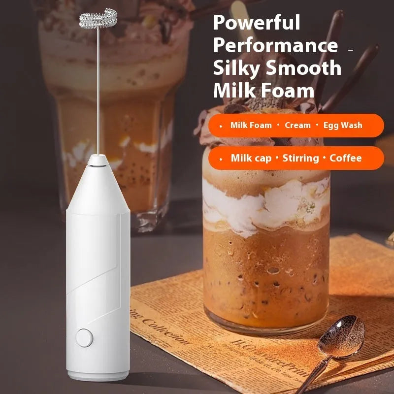 Mini handheld electric milk frother in black, white, or khaki colour with stainless steel whisk and USB port.