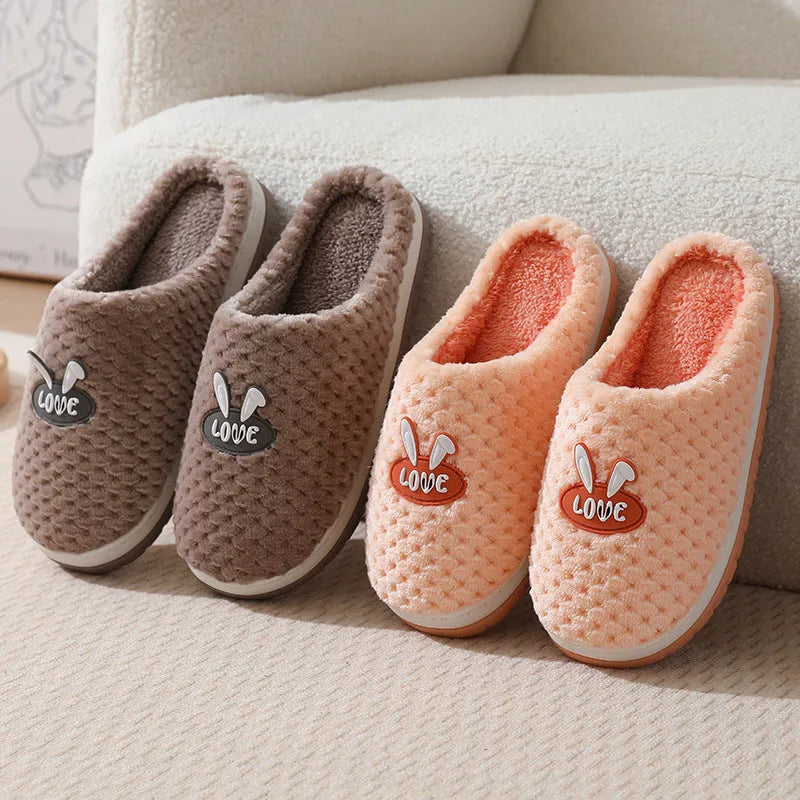 Women's rabbit plaid cotton house slippers with a thick rubber sole, shown in apricot colour.