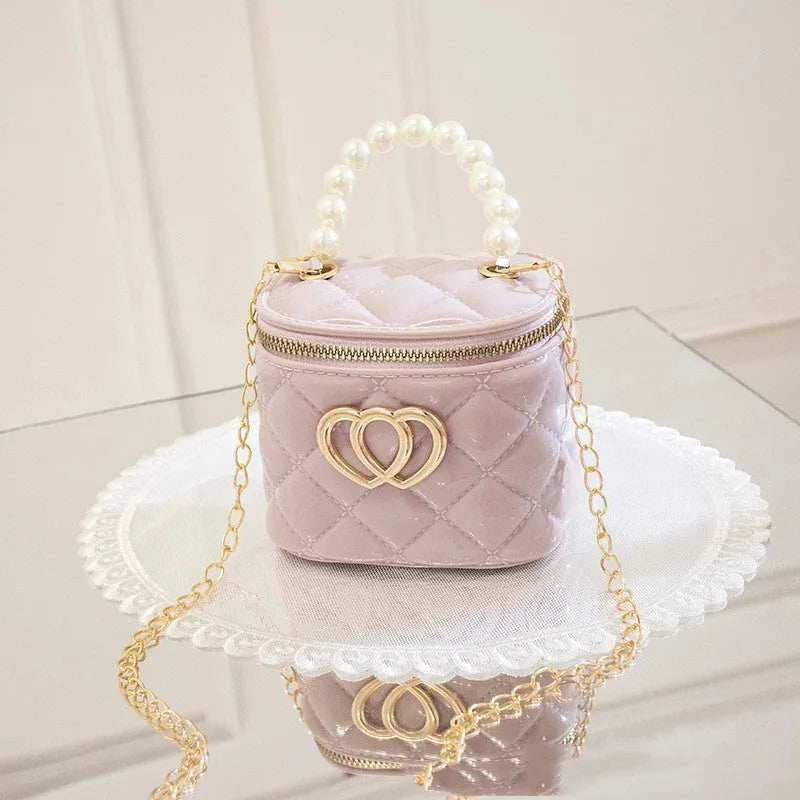 PVC bucket-shaped gel bag with a heart pattern, shown in one of seven available colours.