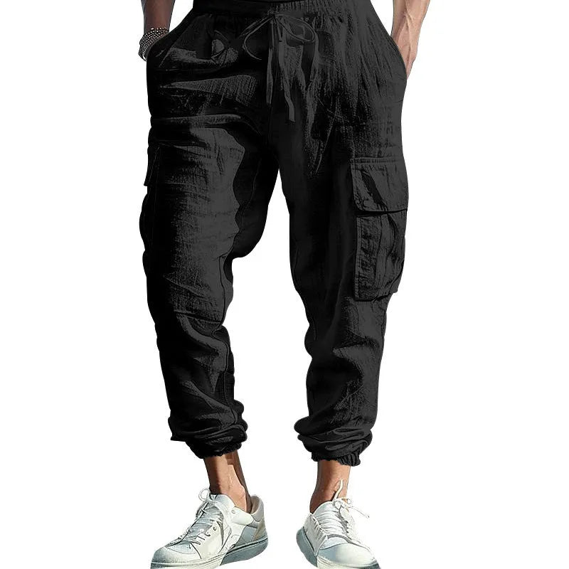 Men's linen casual trousers with drawstring waist and ankle-tied cuffs in solid colours