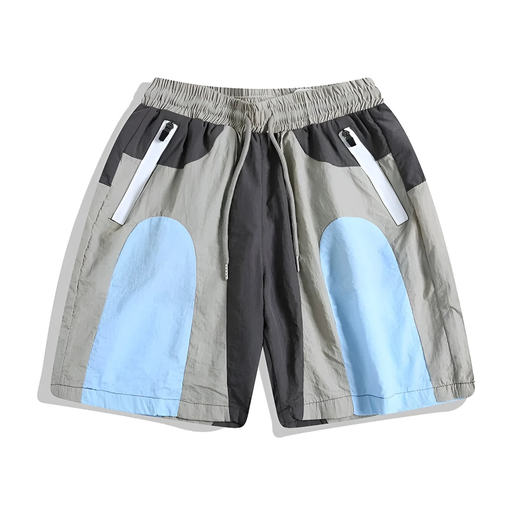 Blue patchwork outdoor sports shorts with loose straight-leg design and quick-drying fabric
