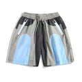 Blue patchwork outdoor sports shorts with loose straight-leg design and quick-drying fabric