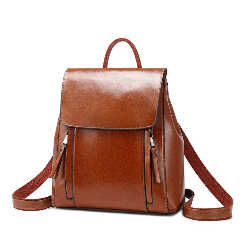 Large genuine leather women's backpack in black with internal organiser pockets and double straps