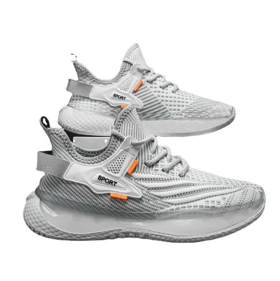 Men's low-top white mesh sneakers with a rubber sole and round toe on a plain background.