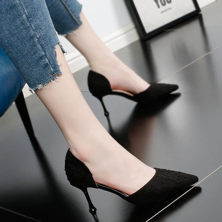 Women's pointed toe stiletto heels with sheepskin and cowhide stitching detail on the upper and rubber sole.