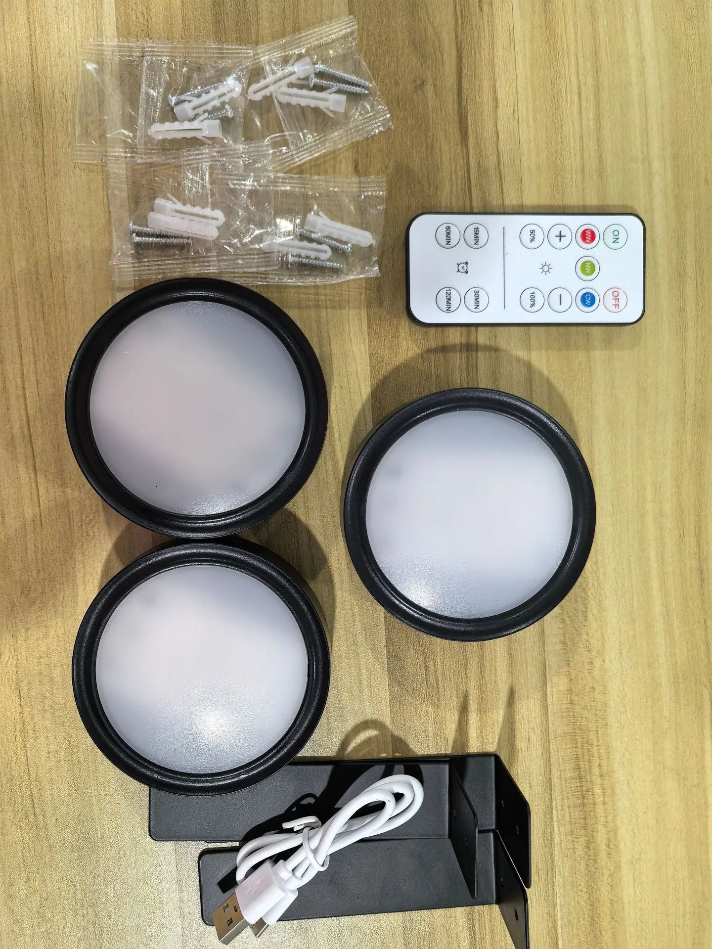 Wireless LED painting lamp with magnetic charging and remote control in black, white or gold finish